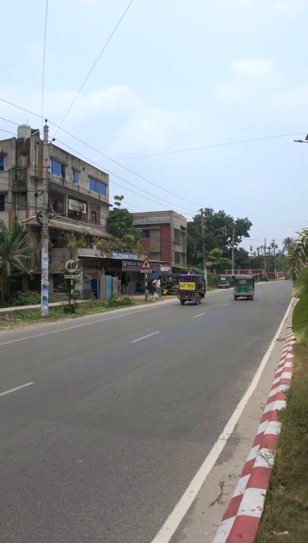 road_scene_vivid_real_same_text.jpg আলফা মোড়ে ৬ কাঠার একটি প্লট বিক্রয় হবে